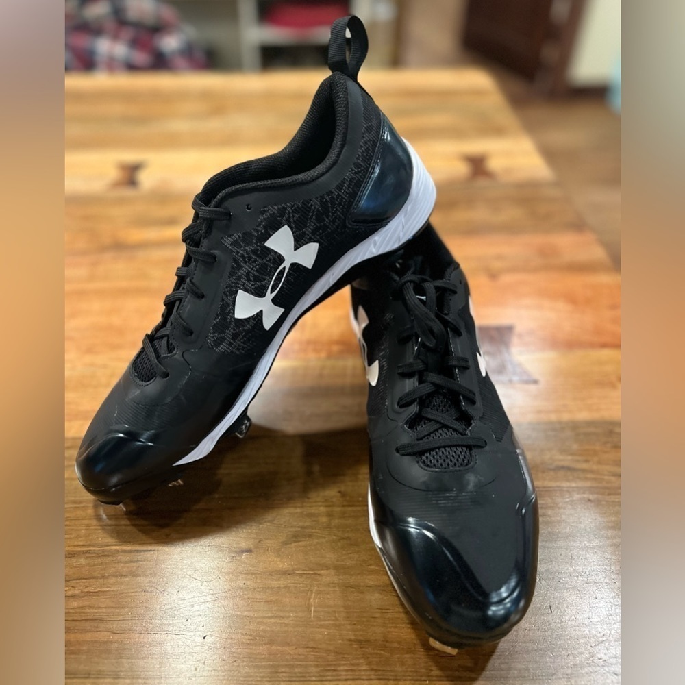 Under Armour “Charged” cleats New Without Tags